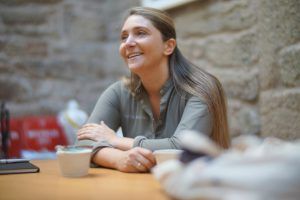 alt= Lucia Freitas inside her restaurant