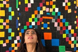 alt= woman photo with siddi quilt