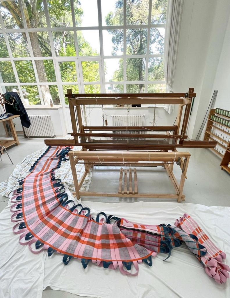 alt= Sarah Viguer_Le Gist_loom with fabric_June 2024